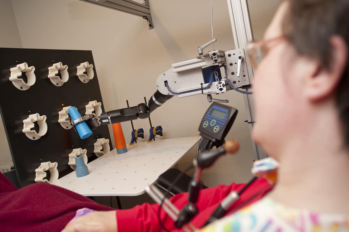 Patient using a brain-machine interface